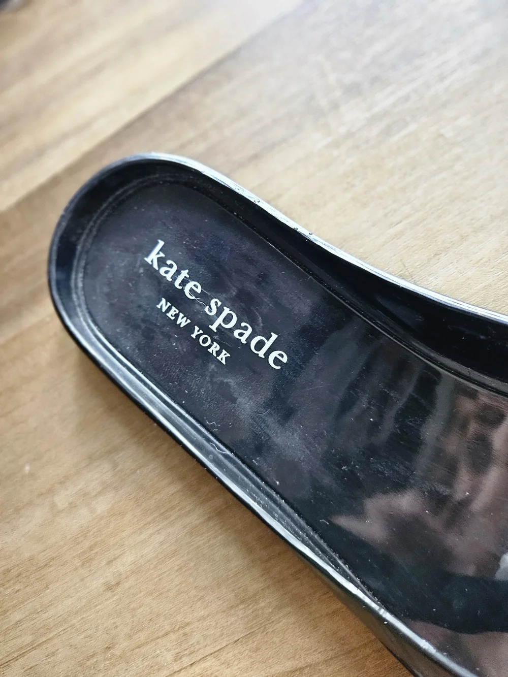 Kate Spade Black Jelly Slide Sandals with White Floral Accent
